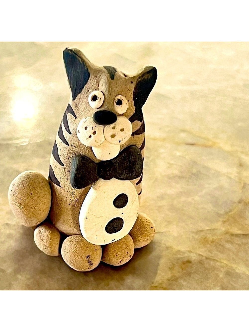 Earthenware bow tie cat figurine. Attributed to Nancy Ecklund happy creature